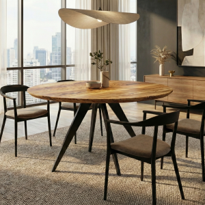Table à manger ronde haut de gamme fabriquée sur mesure en bois d'olivier massif avec un veinage apparent, installée dans un intérieur luxueux à Monaco.